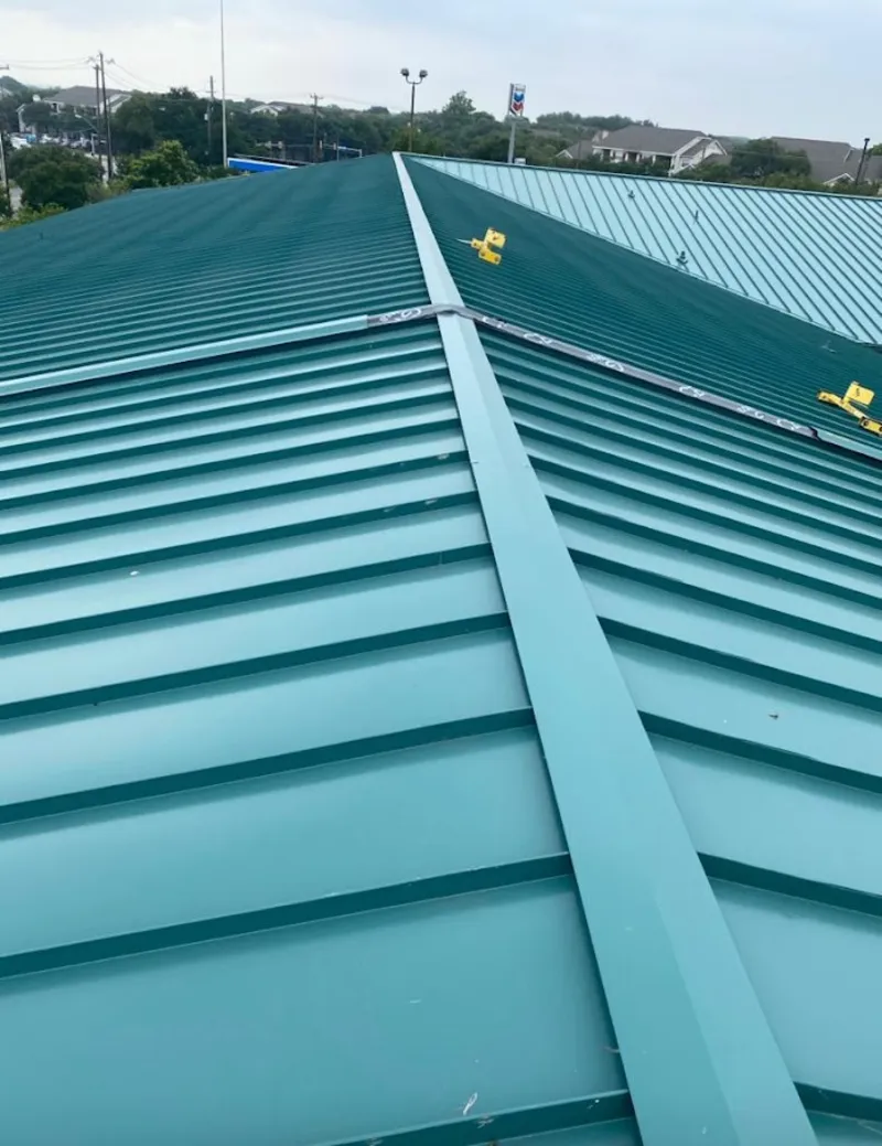 Green commercial metal roof ridge and valley for Metal Roof Repair in Lino Lakes
